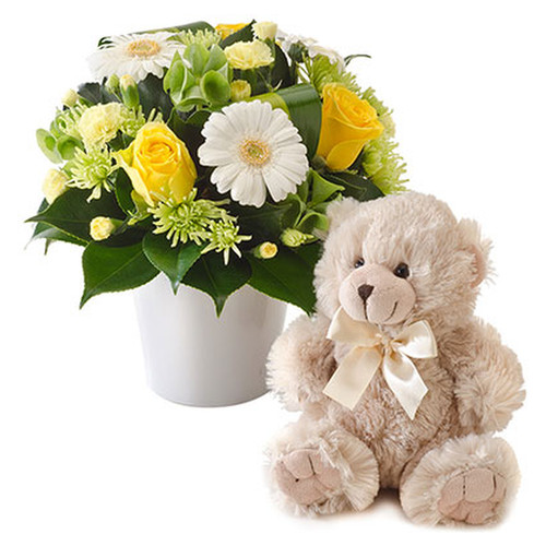 Bright mixed arrangement with a teddy bear