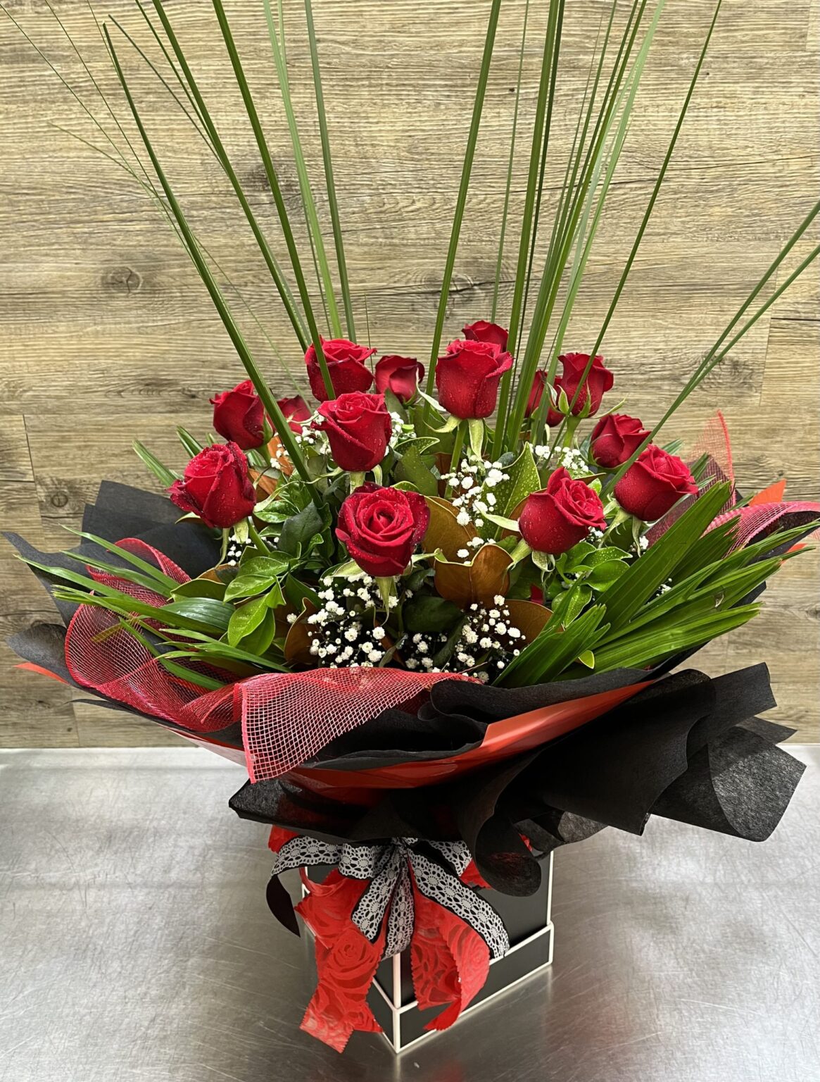 1 Doz Long Stemmed Red Roses With Lush Greenery Lavish Flowers Online